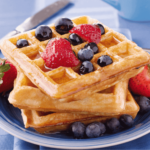 Fluffy waffles drizzled with maple syrup for a classic breakfast treat.
